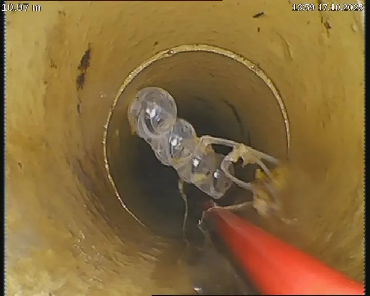 Drain camera view of R&J’s hydrojet nozzle working inside a pipe