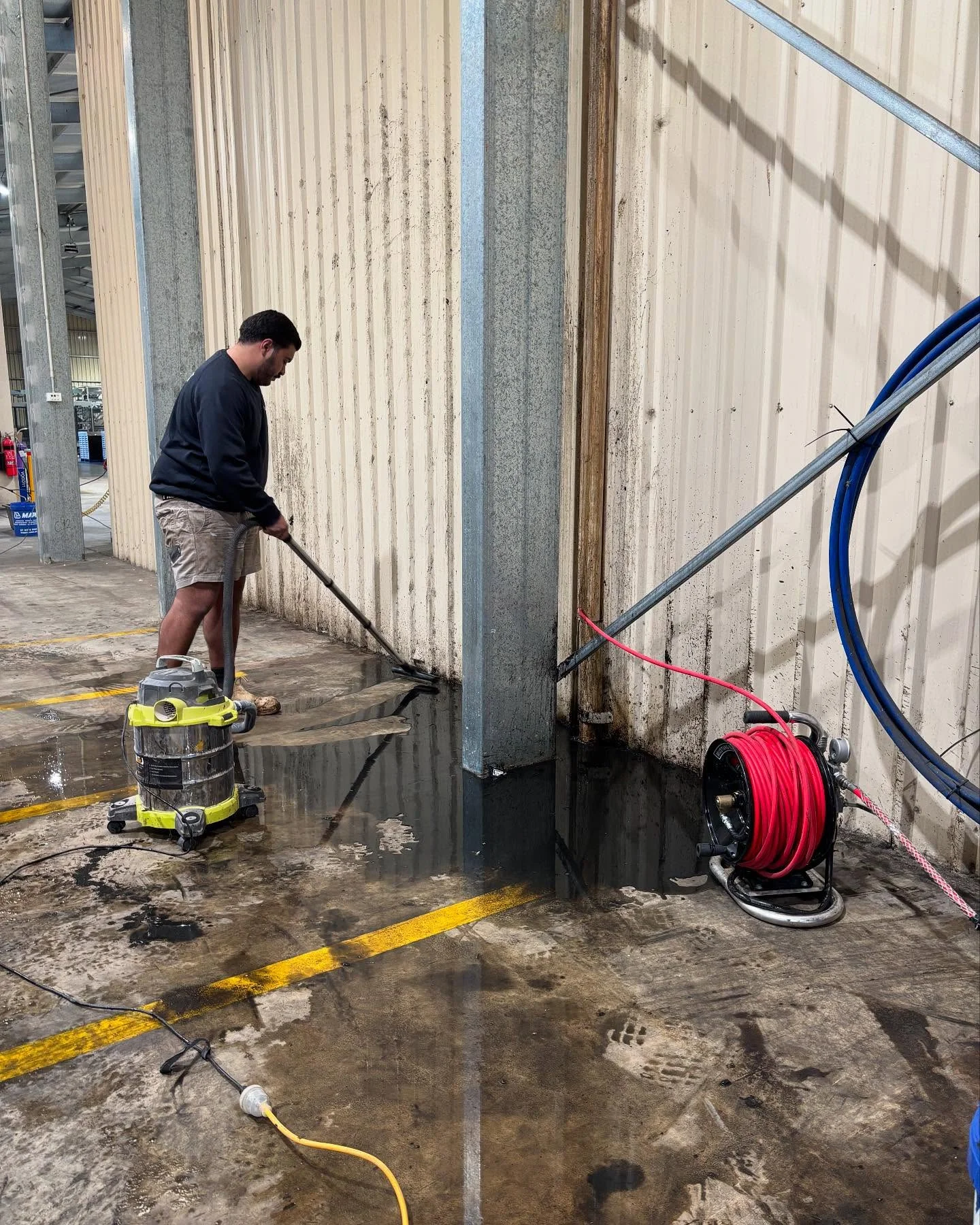 R&J drain-clearance work with inspection equipment at an industrial building